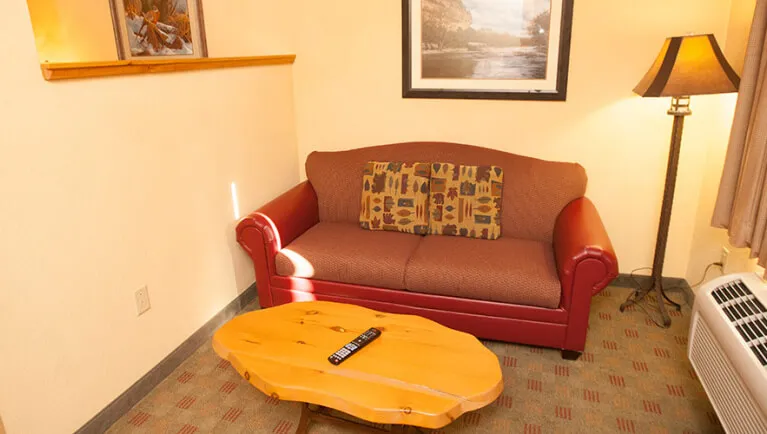 The sofa in the Lone Wolf Fireplace Suite